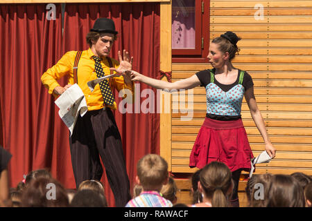 Traveling pantomime company called `Tarkabarka` show in Sopron, Hungary on May 27th 2017. Expressions: derisive and grim Stock Photo
